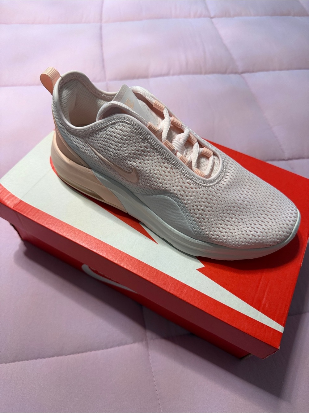 Nike Women’s Light Pink Slip-On Athletic Sneakers